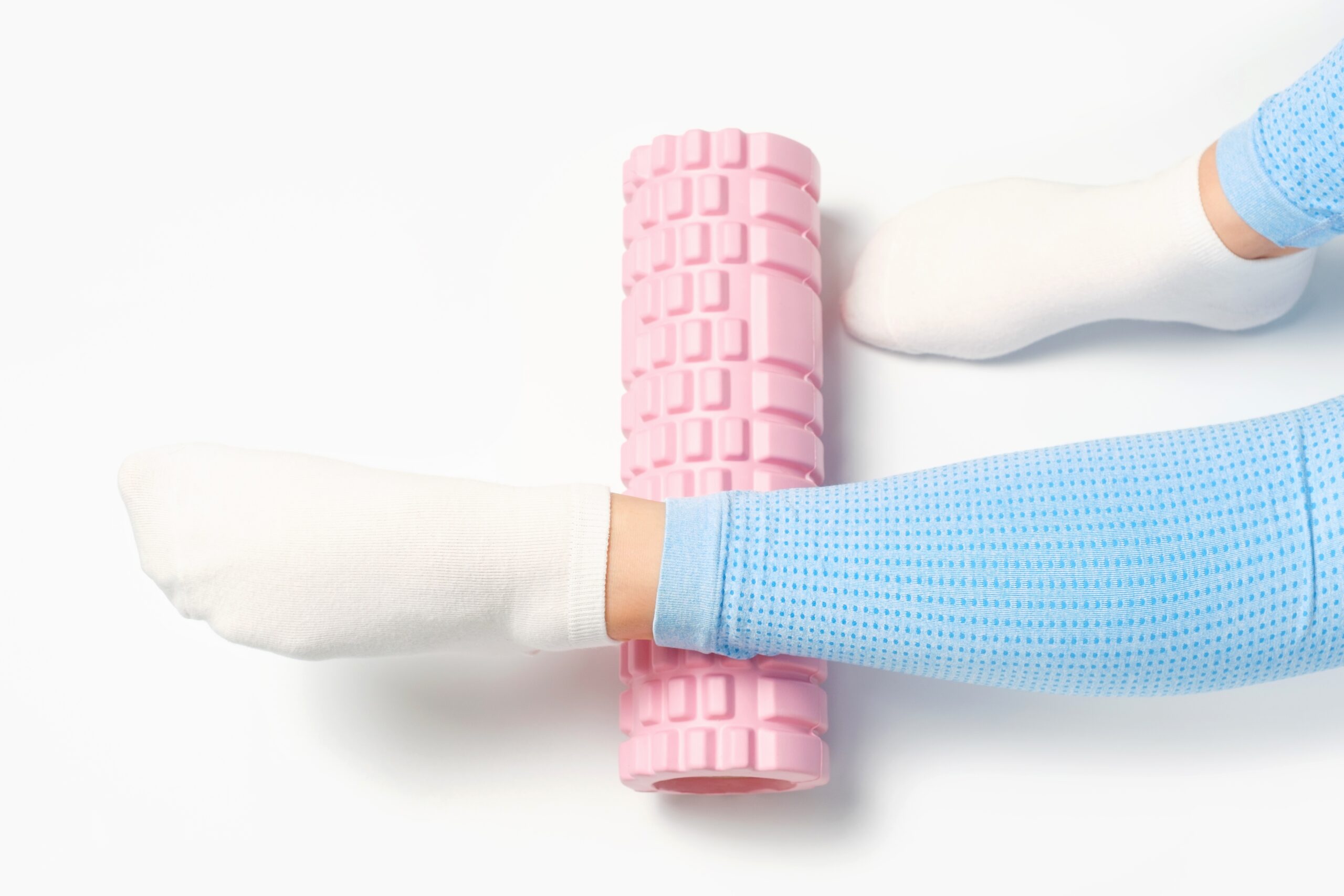 Female,Leg,Rolls,A,Massage,Foam,Roller,Close-up,On,A